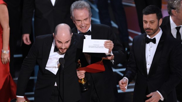 Jordan Horowitz, producer of La La Land, shows the envelope revealing Moonlight as the true winner of best picture.