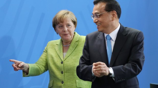 German Chancellor Angela Merkel and Chinese Prime Minister Li Keqiang in Berlin on Friday.
