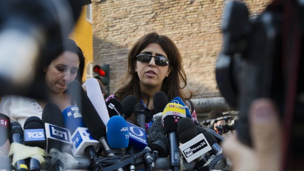 Francesca Chaouqui talks to journalists on Thursday after her conviction by a Vatican court.
