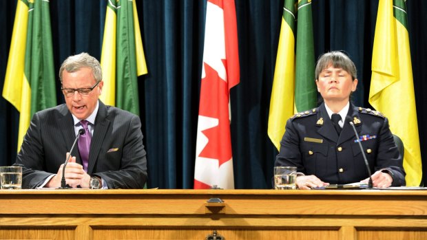 Saskatchewan Premier Brad Wall, left, and Royal Canadian Mounted Police Commanding Officer Brenda Butterworth-Carr at a news conference in the provincial capital Regina on Saturday.