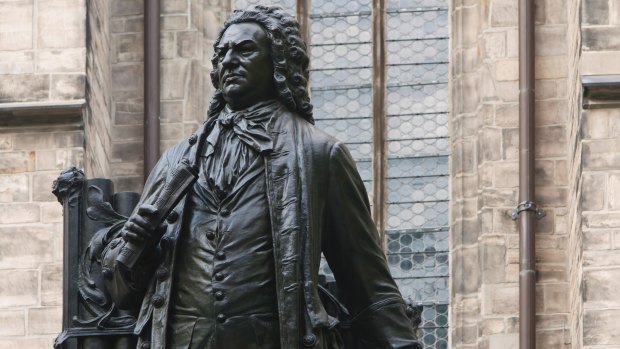 A statue of Johann Sebastian Bach Statue in front of St Thomas's Church, Leipzig, Germany. 