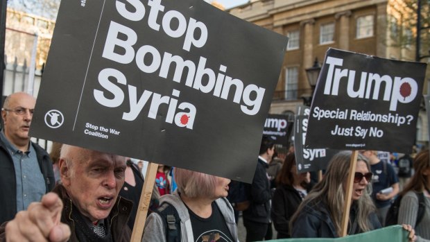 Protesters against the US strike at a Stop the War Coalition demonstration opposite Downing Street, London, on Friday.