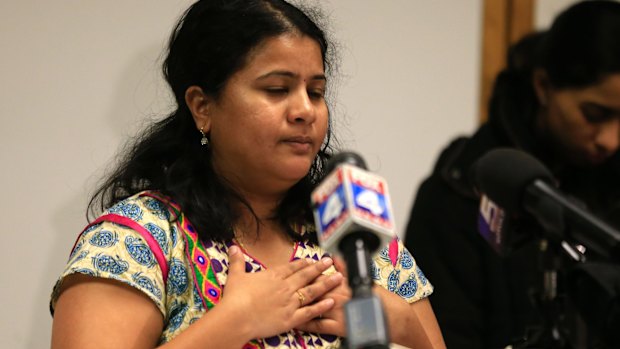 Sunayana Dumala holds her heart while talking about her husband, Srinivas Kuchibhotla, who was shot at a bar in Kansas.