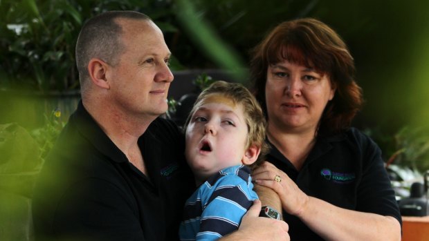 Michael and Jo-Ann Morris with Samuel, aged 7. Samuel was left disabled after a non-fatal drowning in the family pool in 2006 resulted in serious brain injuries. He died in 2014.