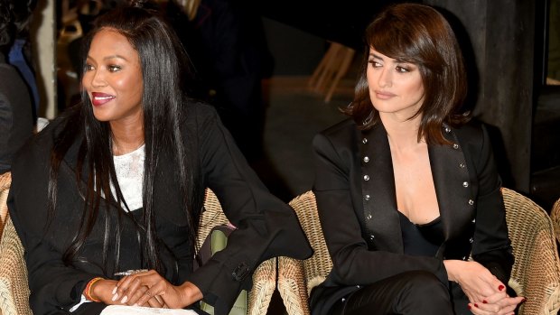 Naomi Campbell and Penelope Cruz attend the Burberry show at London Fashion Week.