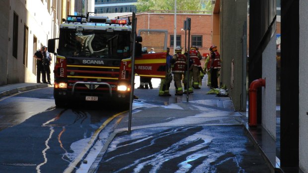 Fire crews at the scene of an electrical fault, which knocked out power to 30 buildings in the Brisbane CBD.