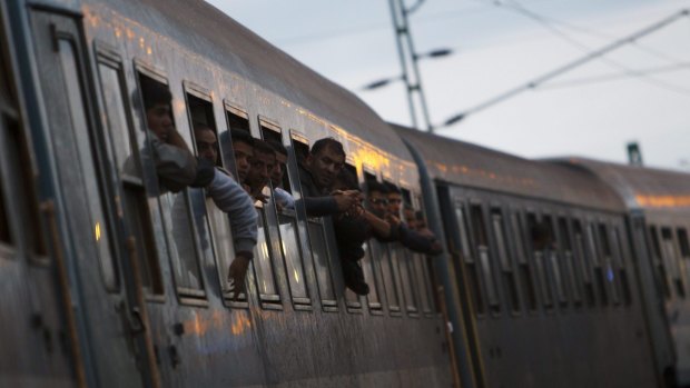 Migrants on a train at the railway station in Zakany, 230 kilometres south-west of Budapest, on Friday.