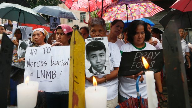 Protesters picket the Philippine Supreme Court to pray for at least eight justices to deny the burial of the late Philippine dictator Ferdinand Marcos at the Heroes' Cemetery.