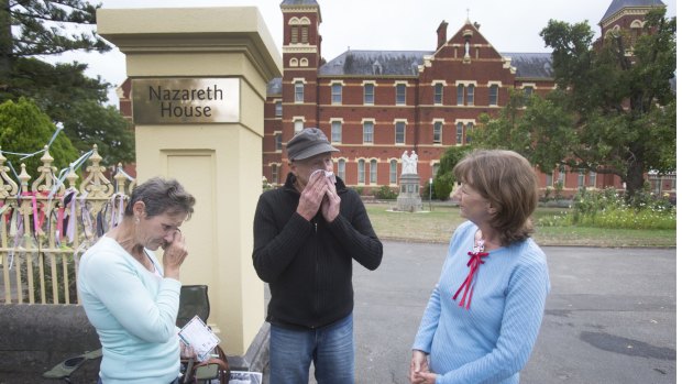 John Skewes joins Wendy Dyckhoff, left, and Gabrielle Short in their vigil outside Nazareth House, in Ballarat.