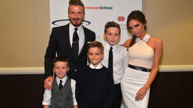 Still strong: David Beckham with wife Victoria Beckham and sons (L-R) Cruz, Romeo and Brooklyn Beckham.