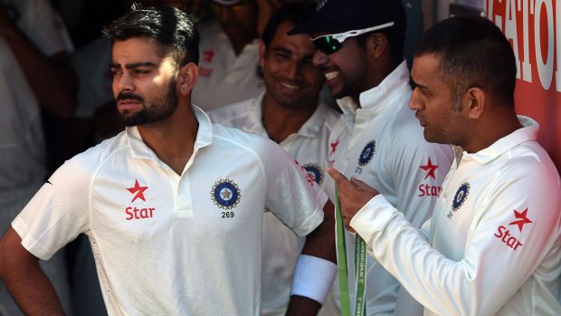 Passing the baton: Virat Kohli will take over the captaincy from MS Dhoni for the Sydney Test.