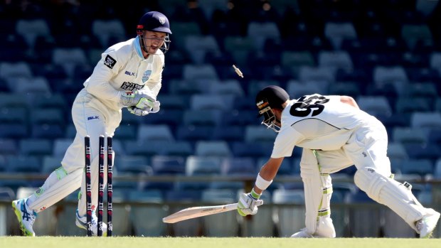 The best of first-class cricket: Western Australia's Josh Inglis is stumped by Peter Nevill at the WACA on Friday as the Sheffield Shield competition resumed.