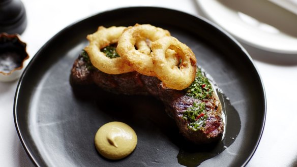 Steak and onion rings at French Saloon.