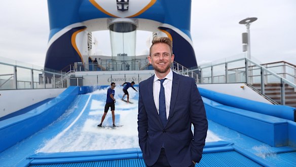 Royal Caribean managing director Adam Armstrong in front of the Flowrider aboard the Ovation of the Seas cruise ship.