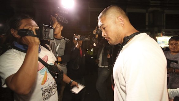 Michael Chan leaves Kerobokan prison after attempting to see his brother Andrew Chan before his transfer.