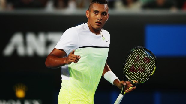 Brilliant: Nick Kyrgios in fashion-conscious white and green.