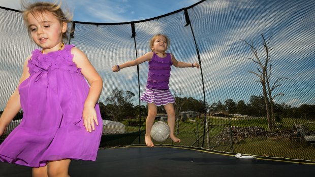 Parents hold out for medical cannabis trial: Bethany Edwards plays at home with younger sister Lara.