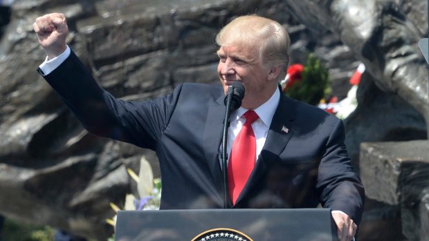 US President Donald Trump delivers a speech in Krasinski Square in Warsaw on Thursday. 