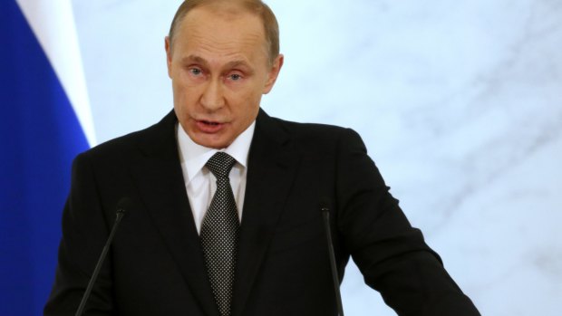 State of the Union: Russian President Vladimir Putin gives his annual address at the Kremlin in Moscow on Thursday.