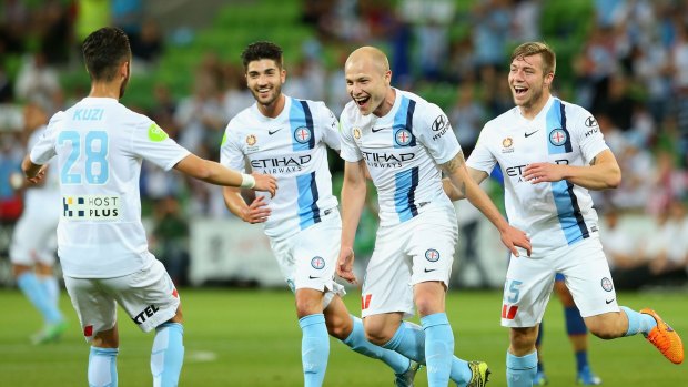 Aaron Mooy of Melbourne is overjoyed after opening his team's account against the Newcastle Jets.