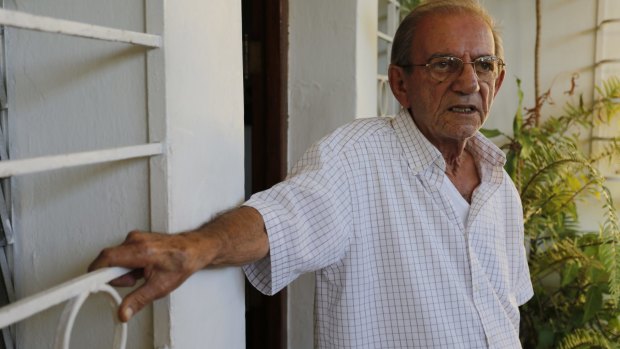 Rolando Sarraff Trujillo's father, also called Rolando Sarraff, outside his home in Havana.