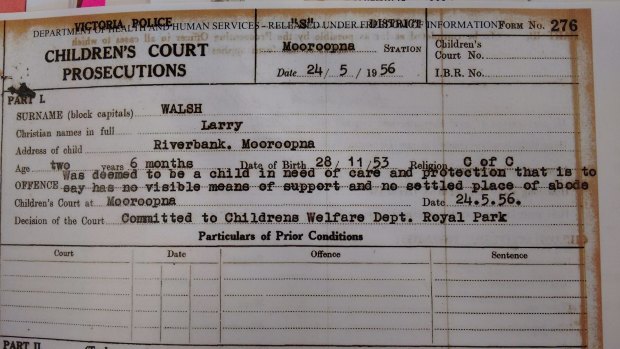 A charge sheet showing Larry Walsh was charged with the criminal offence of being "deemed in need of care and protection" at age 2.