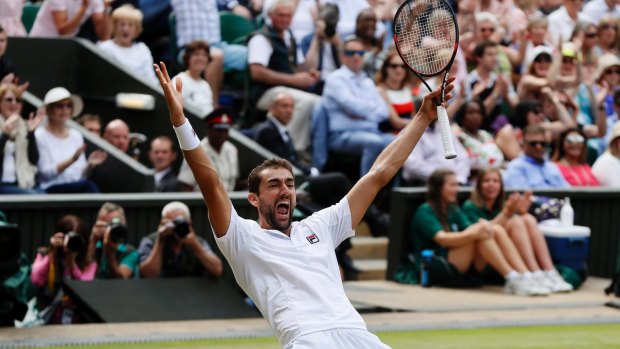 Marin Cilic celebrates after beating Sam Querrey in their semi-final match.