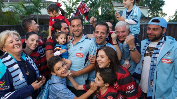  Bossley Park boy and Sydney FC captain Alex Brosque, centre, with his family.