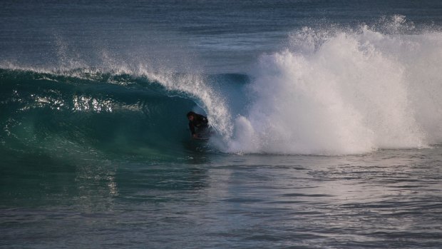 Surfers and bodyboarders were quick to take advantage of the heightened swell in Perth.