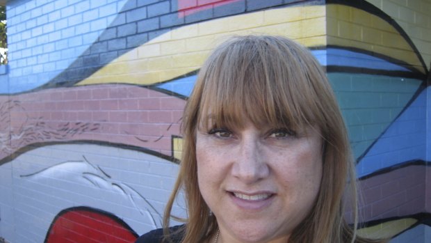 Arty: Living Streets co-ordinator Danella Bennett in front of an Ashcroft mural by Claire Nakazawa.