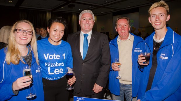 James Milligan (centre) with his wife Katrina (far left) and son Blake (far right) at the Liberal campaign launch at Rex Hotel.