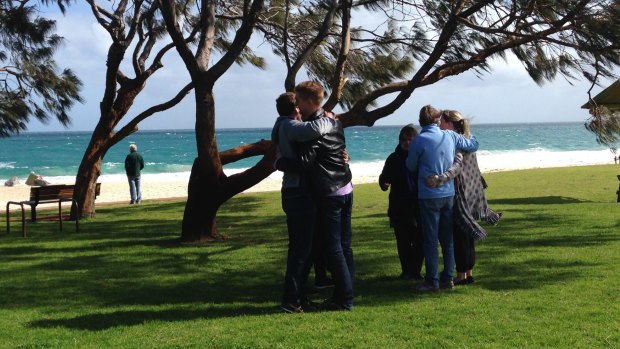 Robyn Santen's worried family at City Beach on Monday morning.