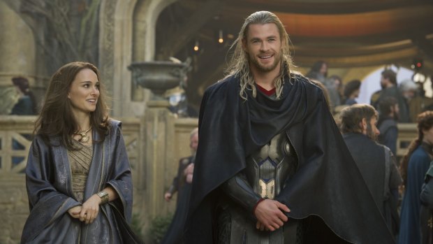 Natalie Portman with Chris Hemsworth in <i>Thor: The Dark World"</i>.