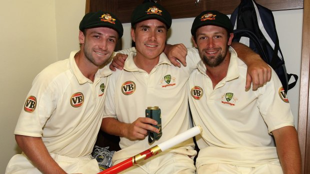 Phil Hughes celebrates victory against South Africa in 2009 with fellow Test debutants Marcus North and Ben Hilfenhaus.
