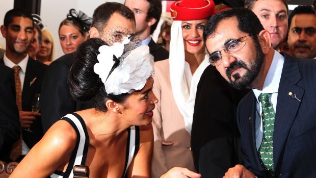 Megan Gale with Sheikh Mohammed bin Rashid al Maktoum, who had another disappointing Cup campaign.