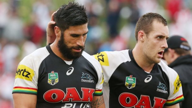 Tough start: Penrith's James Tamou (left) and Isaah Yeo come to terms with their mauling at the hands of the Dragons in round one.