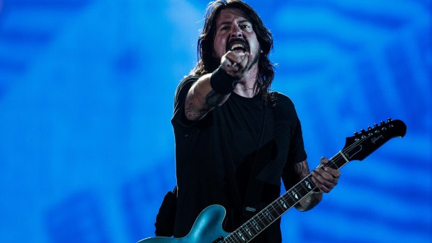 Foo Fighters frontman Dave Grohl on stage during his band's 'Sonic Highways' tour at Etihad Stadium on Saturday night.