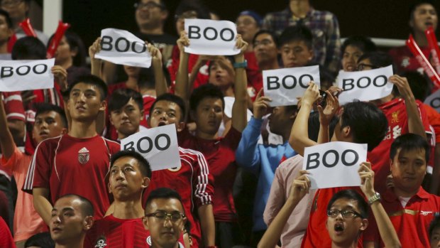 Hong Kong soccer fans boo the Chinese national anthem during the 2018 World Cup Asian qualifying match against China in Hong Kong.