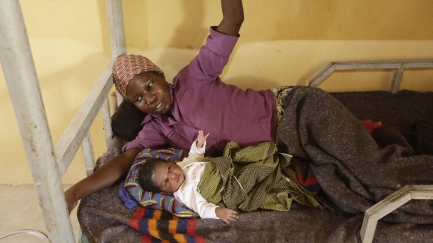 Lami Musa with her five-day-old baby. Her husband was killed before she was abducted by Boko Haram.