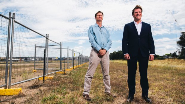 Foy's Bevan Dooley and Stuart Clark at the site of the proposed plastics-to-fuel factory in Hume, now rejected by the ACT government.