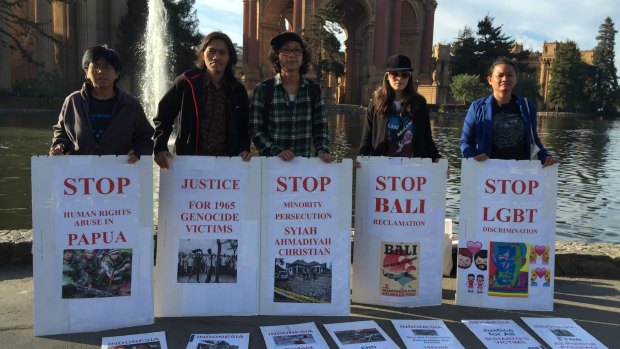 Protesters outside the Palace of Fine ArtsTheatre in San Francisco on Tuesday called on President Joko Widodo to address human rights.