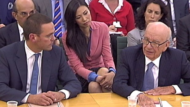 Rupert Murdoch and his son James Murdoch appear before a British parliamentary committee on phone hacking in July 2011. 