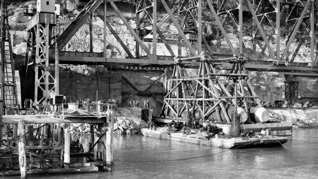 Each of the steel spans was constructed on the southern bank, where a ledge was cut out of a sandstone cliff face 