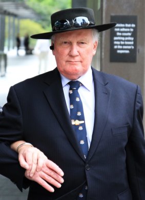 Former Brisbane Grammar School deputy headmaster David Coote leaves the Brisbane Magistrates Court.