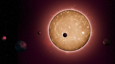 An artist's impression of a new star with five Earth-sized planets which has been discovered by astronomers.