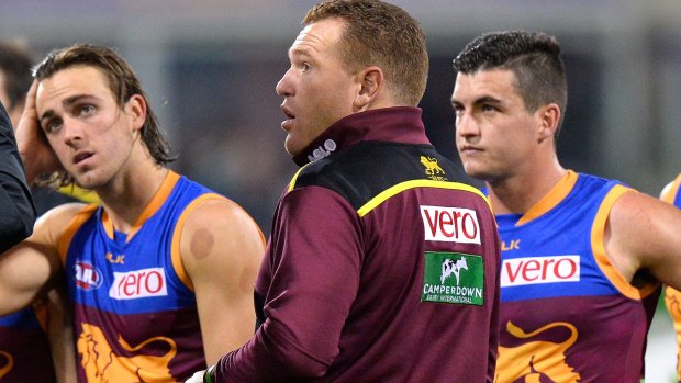 Lions coach Justin Leppitsch and his players come to grips with another loss. 