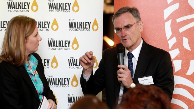 ASIC chief executive Greg Medcraft speaks at a Walkley lunch with  Adele Ferguson in Sydney in 2014.
