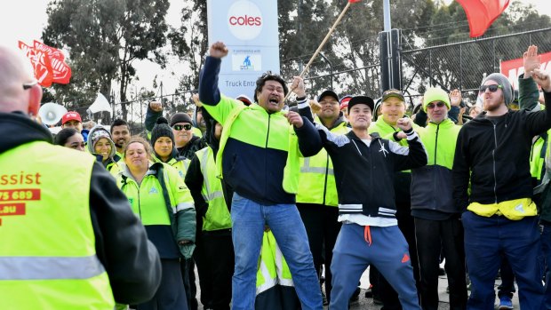 Workers picket a cold storage warehouse that supplies Coles.