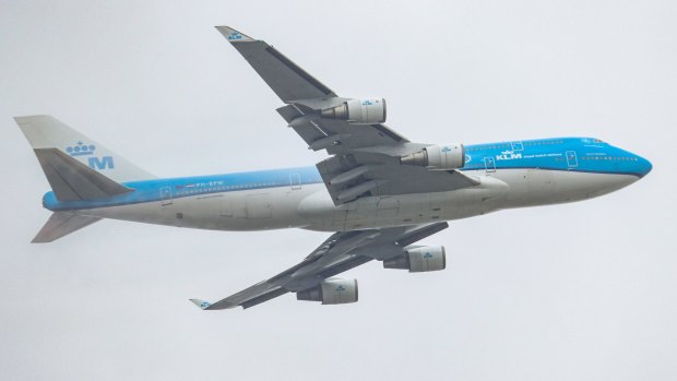 A combi Boeing 747 jumbo get combining freight and passenger seating, flown by KLM.