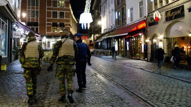 Police patrol near the Grand Place in the centre of Brussels last November. 